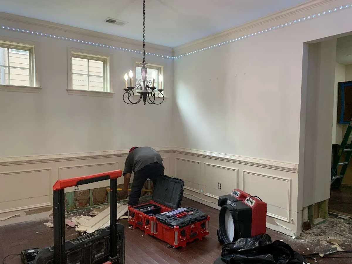 Restoration technician with professional equipment in Pinecrest